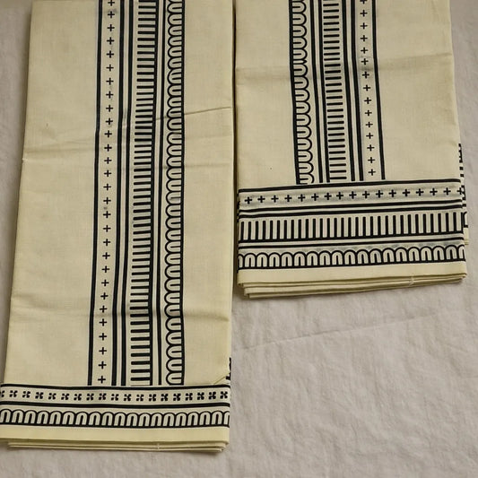 Printed cotton set mundu with designed black line kara border, traditional Kerala handloom by Ramachandra Kuthampully Handlooms.