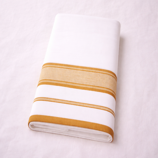 White double mundu with elegant classic kara, traditional Kerala handloom by Ramachandra Kuthampully Handlooms.