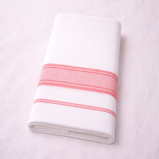 White double mundu with elegant classic kara, traditional Kerala handloom by Ramachandra Kuthampully Handlooms.