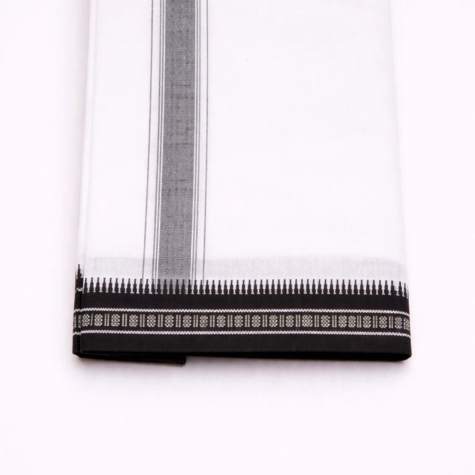 Black kara single mundu with simple border design, traditional Kerala handloom by Ramachandra Kuthampully Handlooms.