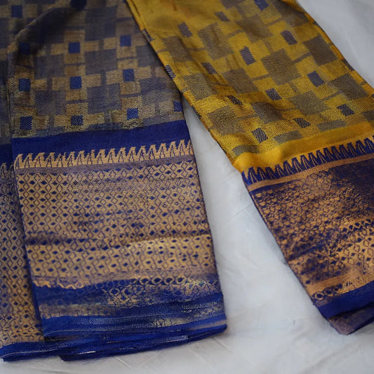 Handloom cotton saree with elegant drape by Ramachandra Kuthampully Handlooms