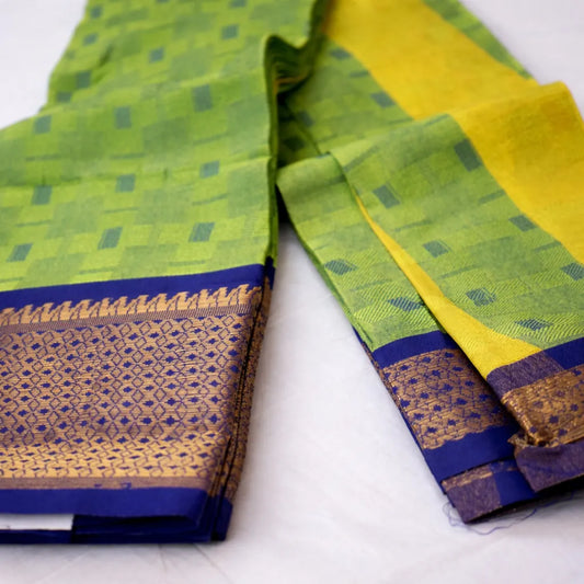 Handloom cotton saree with elegant drape by Ramachandra Kuthampully Handlooms.