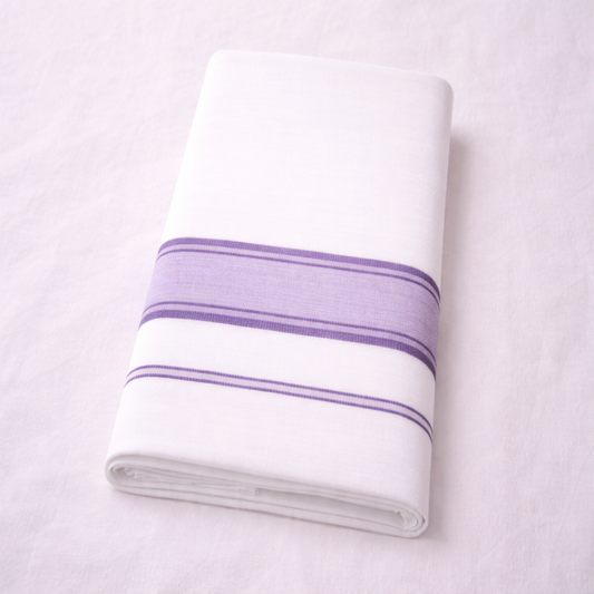 White double mundu with elegant classic kara, traditional Kerala handloom by Ramachandra Kuthampully Handlooms.