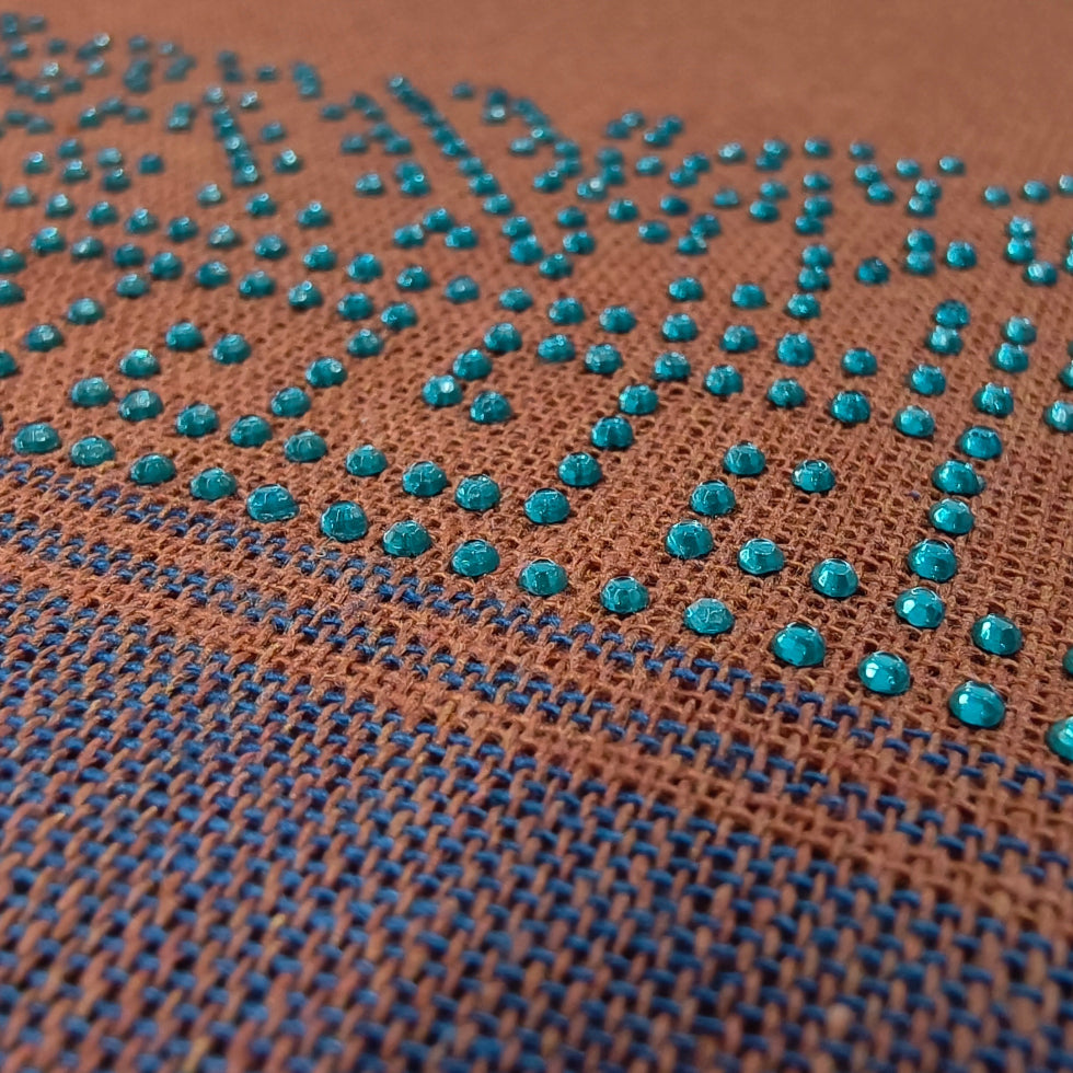 Kavi dhothi with colour dot detailing, traditional Kerala handloom by Ramachandra Kuthampully Handlooms.