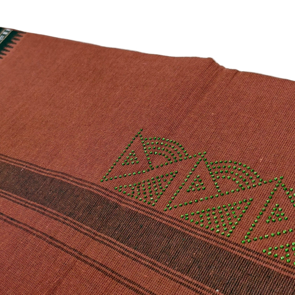 Kavi dhothi with colour dot detailing, traditional Kerala handloom by Ramachandra Kuthampully Handlooms.