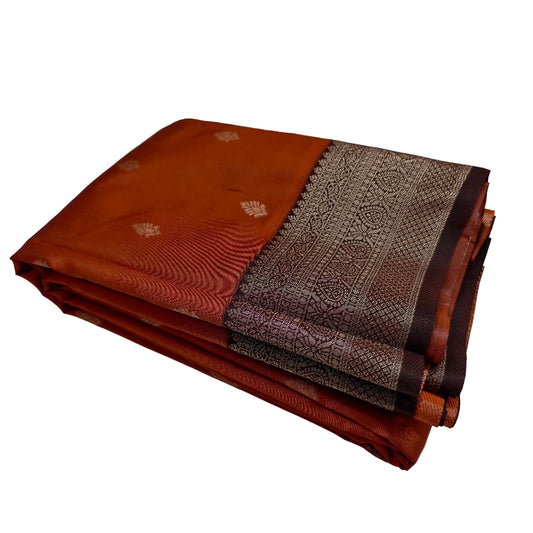 Burned orange saree with coffee brown border by Ramachandra Kuthampully Handlooms.